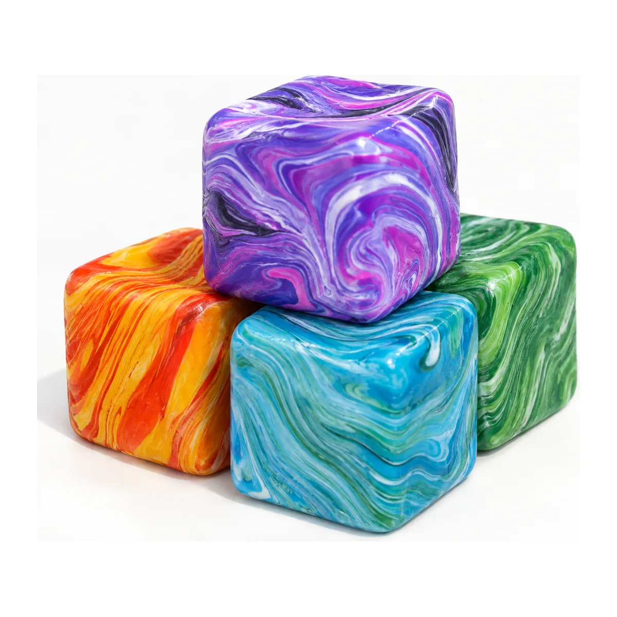 Four Marbled Cube squishies stacked together — purple, orange, blue and green, each marbled differently.